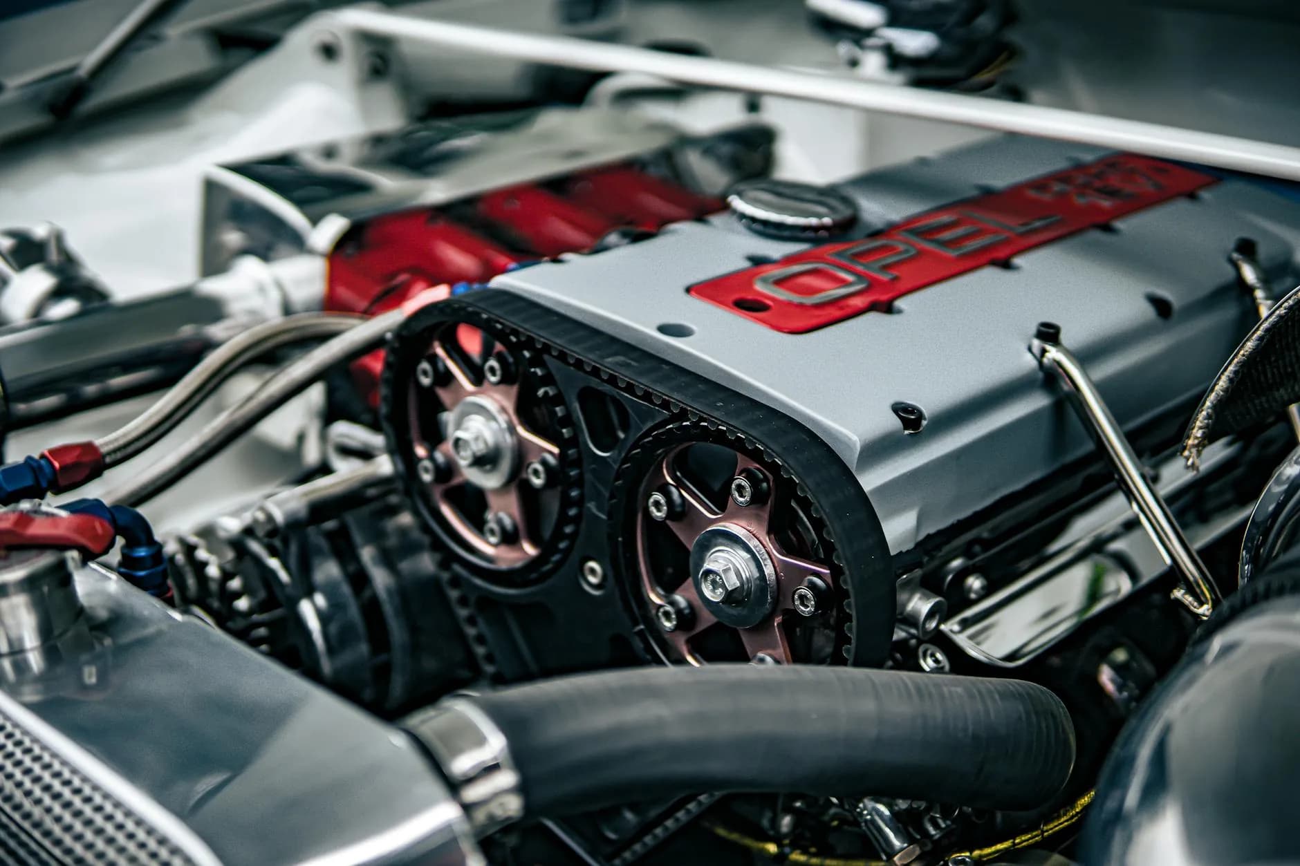 Timing belt and engine pulleys during replacement